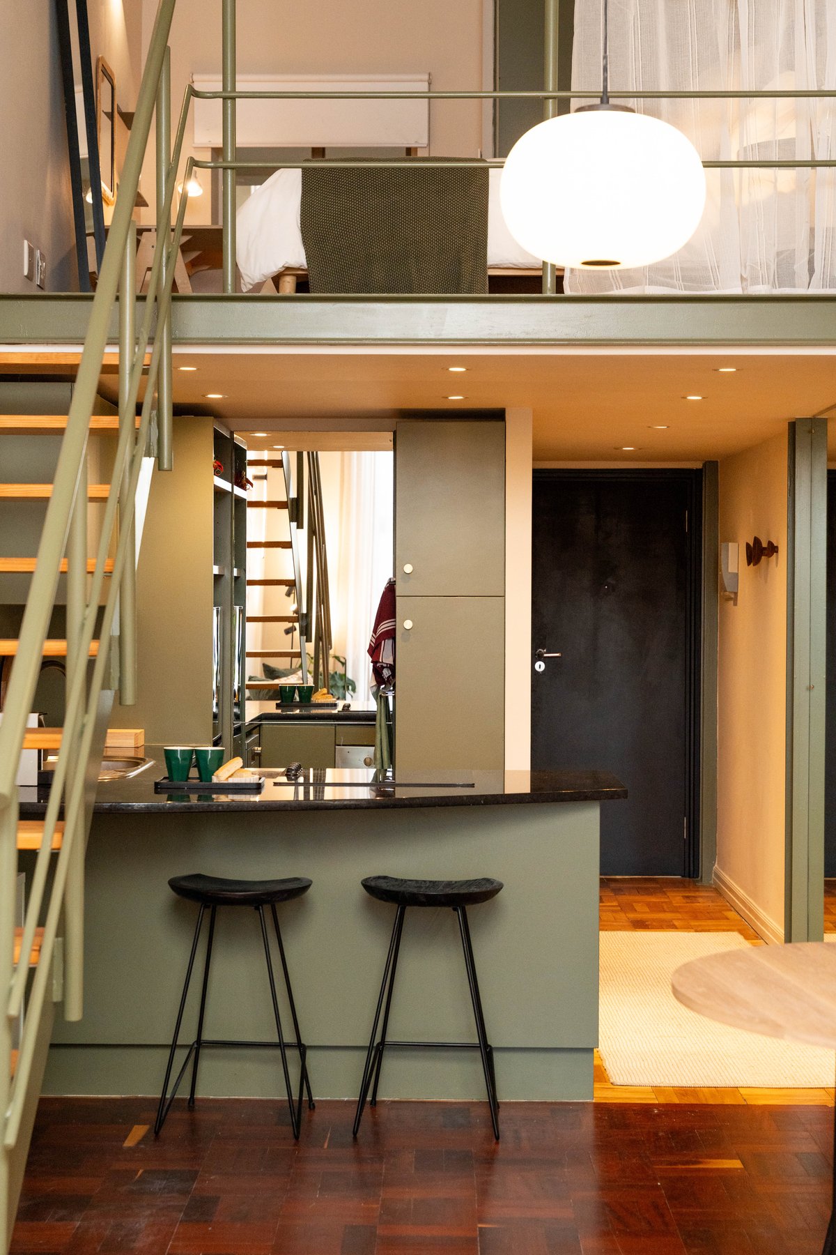 Mezzanine and stair above the living space at Mutual Heights